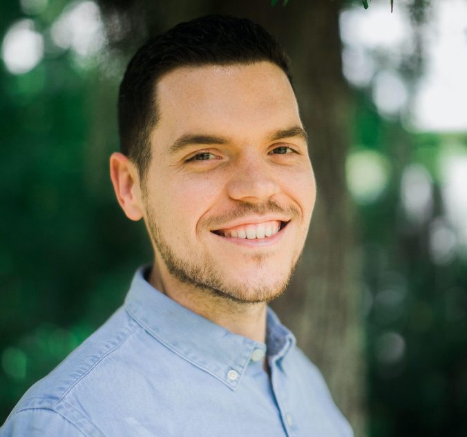 Smiling photo of Dom Kelly